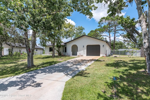 1384 Vancouver Ave SE, Palm Bay, FL 32909 - ranch-style home with stucco siding, a garage, and concrete driveway