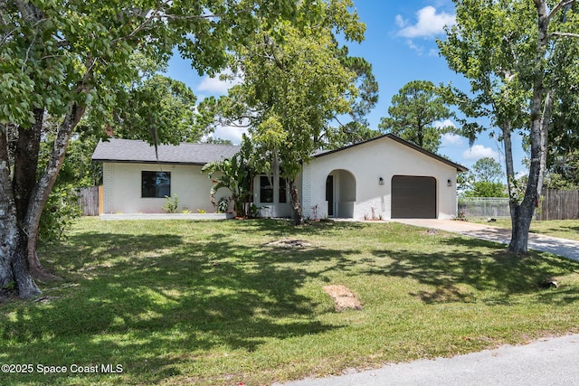 1384 Vancouver Ave SE, Palm Bay, FL 32909 - single story home with an attached garage, driveway, and stucco siding