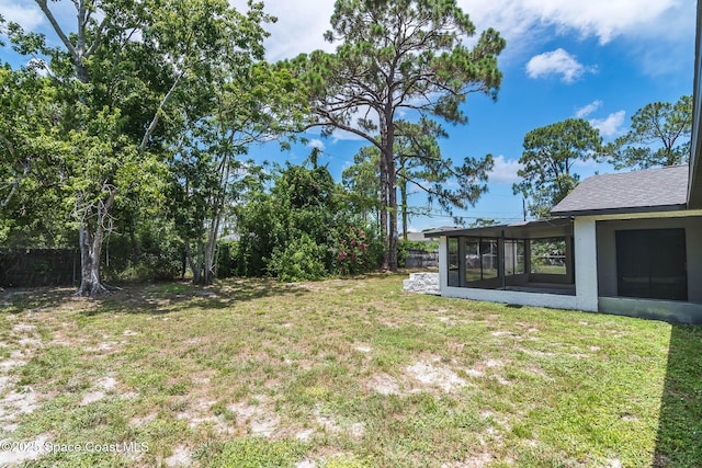 1384 Vancouver Ave SE, Palm Bay, FL 32909 - view of yard featuring a sunroom