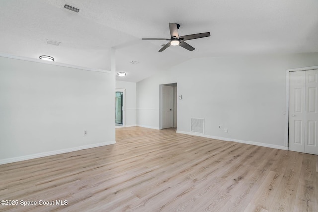 1384 Vancouver Ave SE, Palm Bay, FL 32909 - empty room with ceiling fan, light wood-style flooring, and lofted ceiling