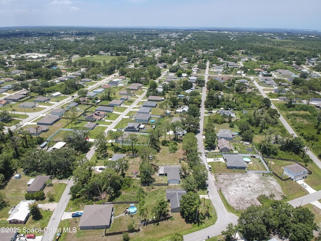 1384 Vancouver Ave SE, Palm Bay, FL 32909 - aerial view of property and surrounding area featuring nearby suburban area