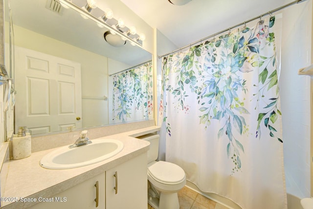 6980 Cairo Rd, Cocoa, FL 32927 - full bath with vanity, tile patterned flooring, and shower / bath combo with shower curtain