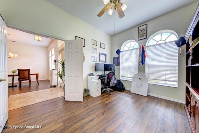6980 Cairo Rd, Cocoa, FL 32927 - office featuring a chandelier, a ceiling fan, and dark wood finished floors