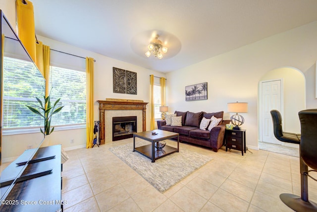 6980 Cairo Rd, Cocoa, FL 32927 - living room featuring ceiling fan, light tile patterned flooring, and plenty of natural light