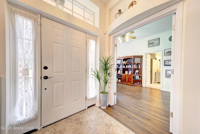 6980 Cairo Rd, Cocoa, FL 32927 - entrance foyer with wood finished floors and a ceiling fan