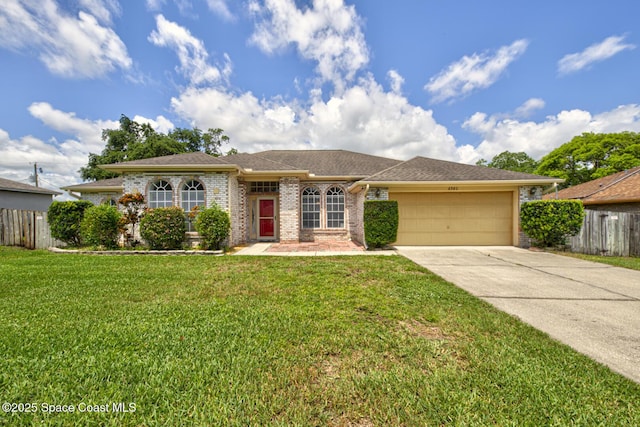 6980 Cairo Rd, Cocoa, FL 32927 - ranch-style home featuring a garage, concrete driveway, and brick siding