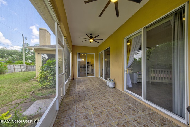 6980 Cairo Rd, Cocoa, FL 32927 - unfurnished sunroom with ceiling fan