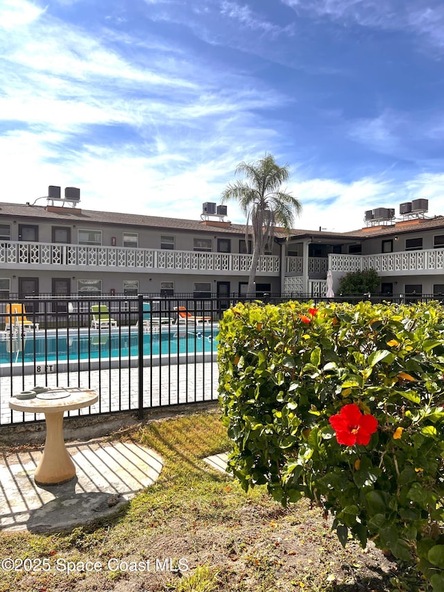 5600 N Banana River Blvd Unit 38, Cocoa Beach, FL 32931 - community pool with a patio