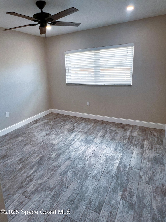 5600 N Banana River Blvd Unit 38, Cocoa Beach, FL 32931 - spare room with a ceiling fan and wood finished floors