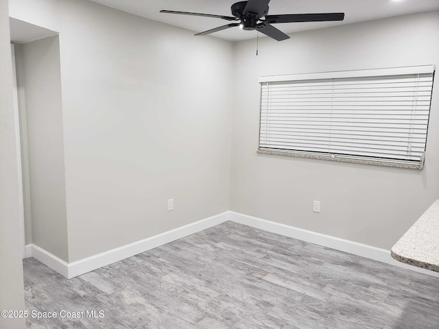5600 N Banana River Blvd Unit 38, Cocoa Beach, FL 32931 - empty room featuring ceiling fan and wood finished floors