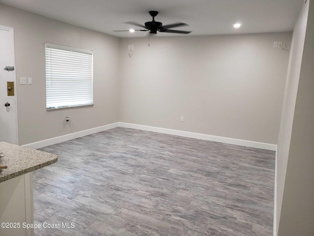 5600 N Banana River Blvd Unit 38, Cocoa Beach, FL 32931 - empty room featuring ceiling fan, wood finished floors, and recessed lighting