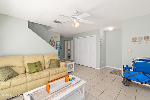 105 Ocean View Ln, Melbourne, FL 32903 - living area featuring a ceiling fan and light tile patterned flooring