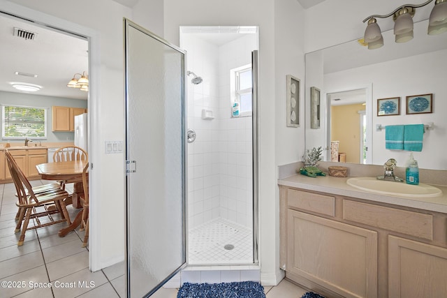 105 Ocean View Ln, Melbourne, FL 32903 - full bathroom with a stall shower, vanity, and tile patterned floors
