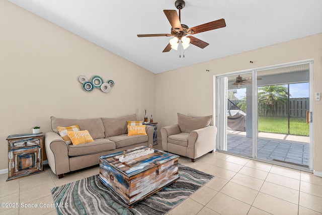 147 Ocean View Ln, Melbourne, FL 32903 - living area featuring ceiling fan, light tile patterned flooring, and lofted ceiling