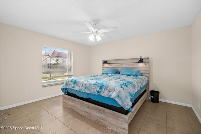147 Ocean View Ln, Melbourne, FL 32903 - bedroom featuring tile patterned flooring and a ceiling fan