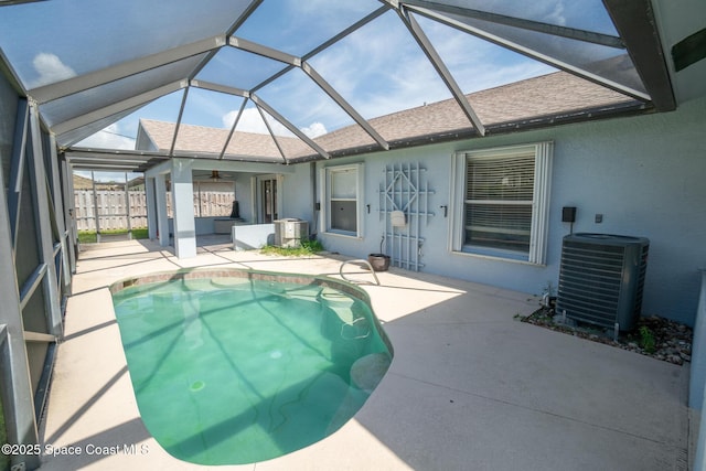 147 Ocean View Ln, Melbourne, FL 32903 - outdoor pool featuring a patio area, ceiling fan, and a lanai