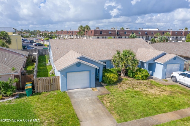 147 Ocean View Ln, Melbourne, FL 32903 - view of front of house with driveway, stucco siding, a residential view, and an attached garage