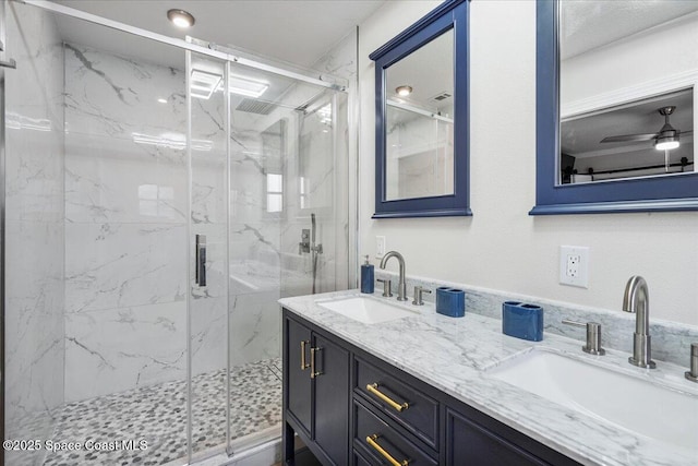 513 Ronnie Dr, Indian Harbour Beach, FL 32937 - bathroom featuring double vanity and a marble finish shower