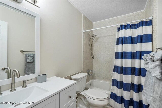 513 Ronnie Dr, Indian Harbour Beach, FL 32937 - full bath with vanity, shower / tub combo with curtain, and a textured ceiling