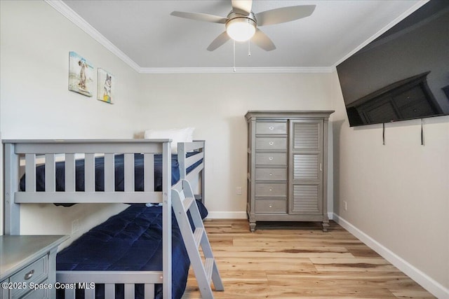 513 Ronnie Dr, Indian Harbour Beach, FL 32937 - bedroom with crown molding, light wood-type flooring, and a ceiling fan