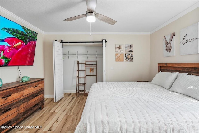 513 Ronnie Dr, Indian Harbour Beach, FL 32937 - bedroom featuring ornamental molding, light wood-type flooring, and ceiling fan