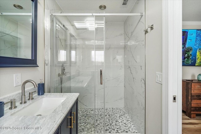 513 Ronnie Dr, Indian Harbour Beach, FL 32937 - full bathroom featuring vanity and a marble finish shower