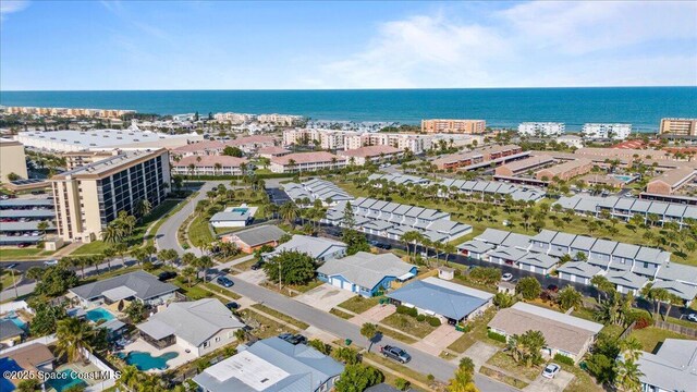 513 Ronnie Dr, Indian Harbour Beach, FL 32937 - aerial overview of property's location with a large body of water