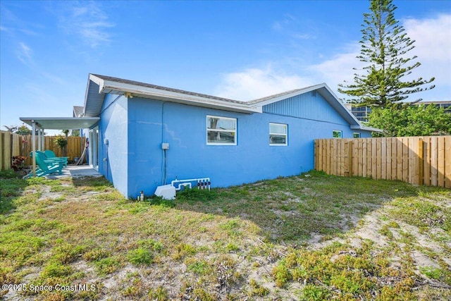 513 Ronnie Dr, Indian Harbour Beach, FL 32937 - back of house featuring a fenced backyard