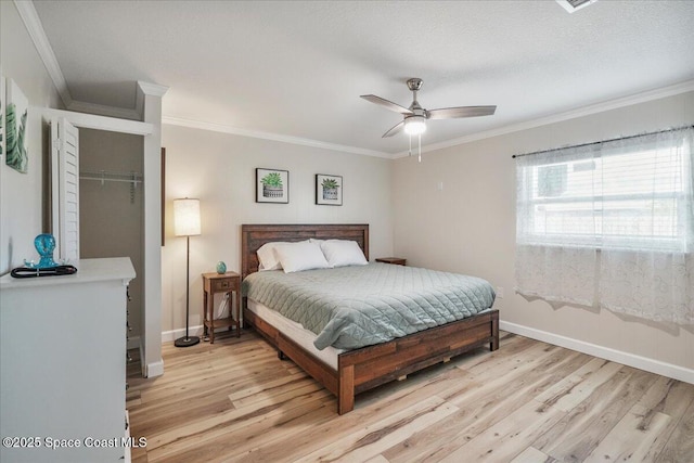 513 Ronnie Dr, Indian Harbour Beach, FL 32937 - bedroom featuring light wood-style flooring, ornamental molding, and a ceiling fan