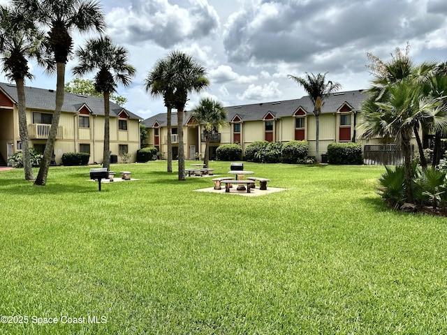 2190 Forest Knoll Dr NE Unit 90-202, Palm Bay, FL 32905 - view of property's community with a lawn