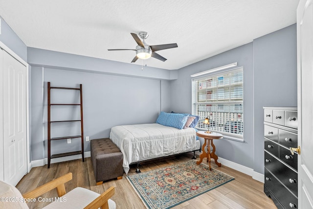 3360 S Atlantic Ave Unit 212, Cocoa Beach, FL 32931 - bedroom featuring wood finished floors and a ceiling fan