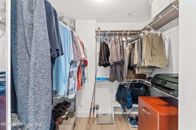 3360 S Atlantic Ave Unit 212, Cocoa Beach, FL 32931 - spacious closet featuring wood finished floors