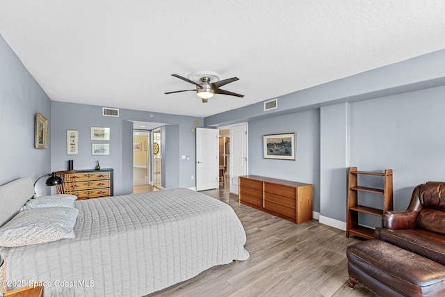3360 S Atlantic Ave Unit 212, Cocoa Beach, FL 32931 - bedroom featuring light wood-style floors and a ceiling fan