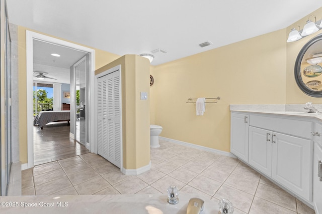 3360 S Atlantic Ave Unit 212, Cocoa Beach, FL 32931 - bathroom featuring vanity, tile patterned floors, and a ceiling fan
