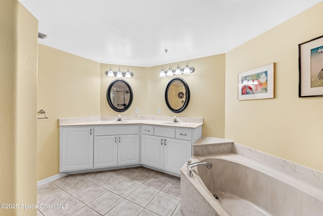 3360 S Atlantic Ave Unit 212, Cocoa Beach, FL 32931 - full bath featuring double vanity, a bath, and tile patterned floors