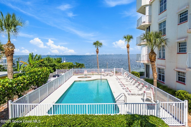 3360 S Atlantic Ave Unit 212, Cocoa Beach, FL 32931 - community pool featuring a water view and a patio area