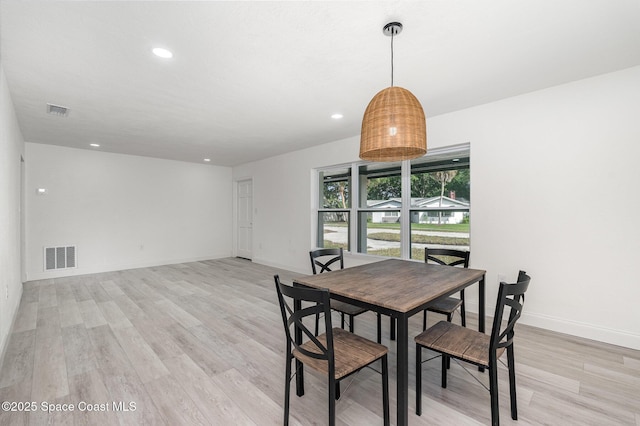 320 Alabama Ave, Merritt Island, FL 32953 - dining room with light wood-style flooring and recessed lighting