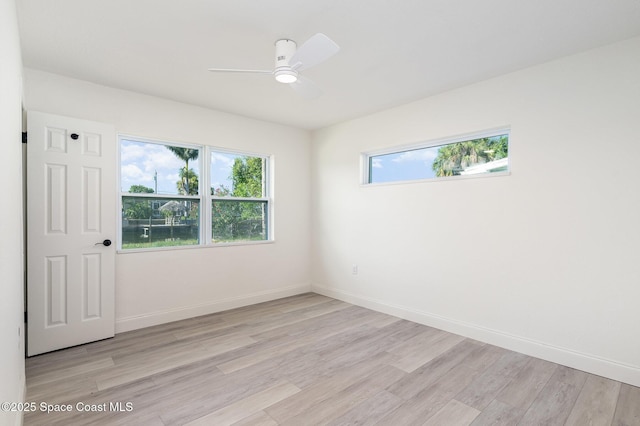 320 Alabama Ave, Merritt Island, FL 32953 - spare room with light wood-style floors and ceiling fan