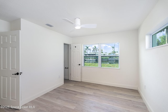 320 Alabama Ave, Merritt Island, FL 32953 - spare room featuring light wood-style flooring and ceiling fan