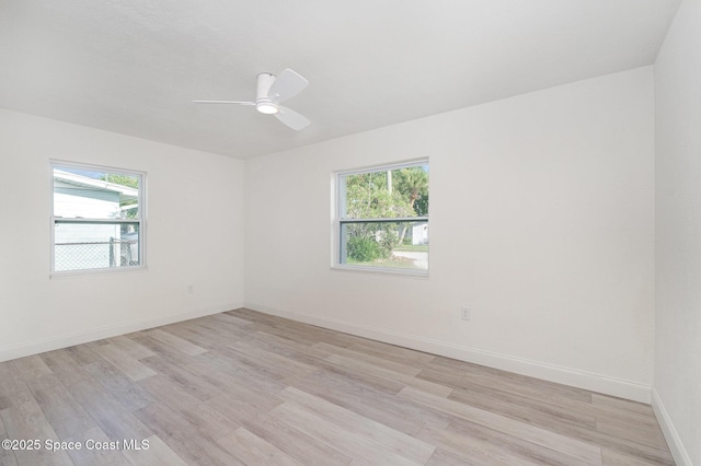 320 Alabama Ave, Merritt Island, FL 32953 - empty room with light wood-type flooring and a ceiling fan