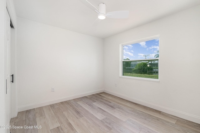 320 Alabama Ave, Merritt Island, FL 32953 - spare room with light wood-style floors and ceiling fan