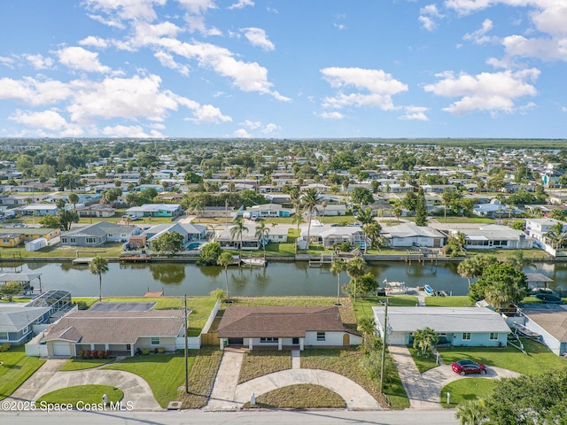 320 Alabama Ave, Merritt Island, FL 32953 - aerial perspective of suburban area featuring a nearby body of water