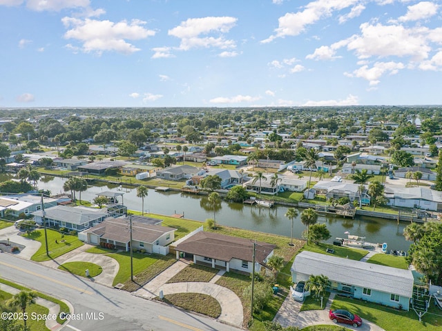 320 Alabama Ave, Merritt Island, FL 32953 - aerial perspective of suburban area with a nearby body of water