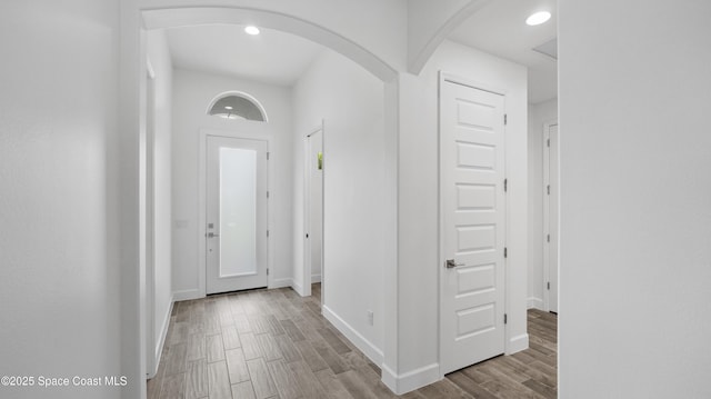 3110 Addison Dr, Melbourne, FL 32940 - entryway with wood finished floors, recessed lighting, and arched walkways