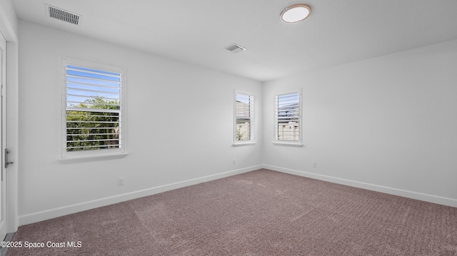 3110 Addison Dr, Melbourne, FL 32940 - carpeted empty room featuring baseboards