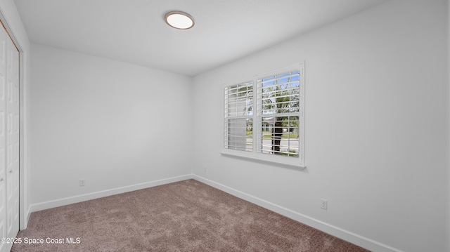 3110 Addison Dr, Melbourne, FL 32940 - unfurnished bedroom featuring carpet flooring and a closet
