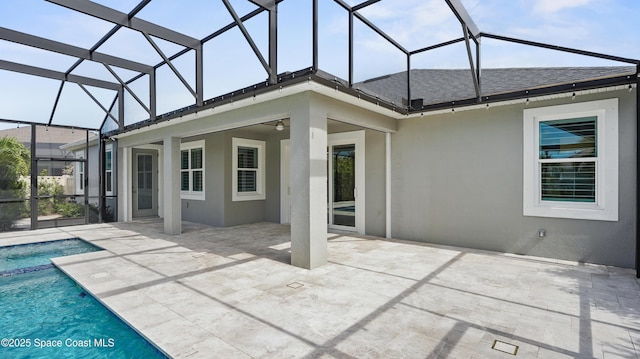 3110 Addison Dr, Melbourne, FL 32940 - rear view of property with stucco siding, a patio area, glass enclosure, a shingled roof, and a pool with connected hot tub