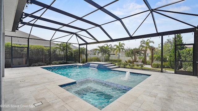 3110 Addison Dr, Melbourne, FL 32940 - view of pool featuring a pool with connected hot tub, a patio area, and glass enclosure