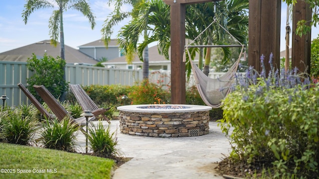 3110 Addison Dr, Melbourne, FL 32940 - view of patio / terrace with a fire pit