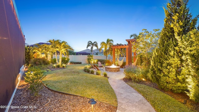 3110 Addison Dr, Melbourne, FL 32940 - view of yard with a patio and an outdoor fire pit